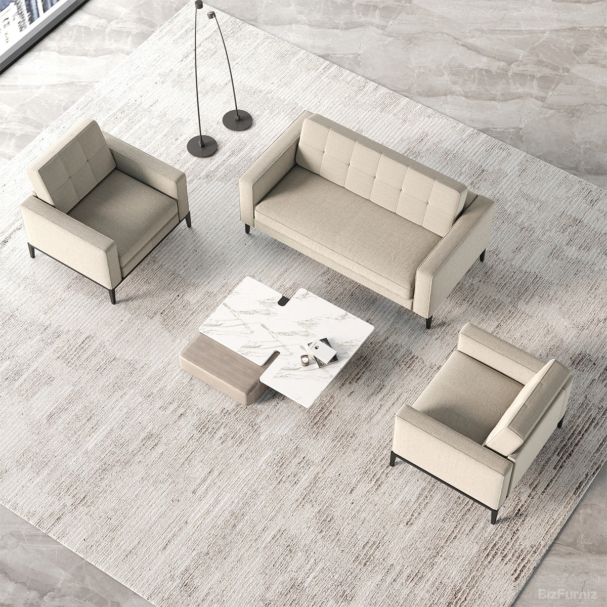 Beige sofa set with two armchairs and a coffee table on a light wooden floor.